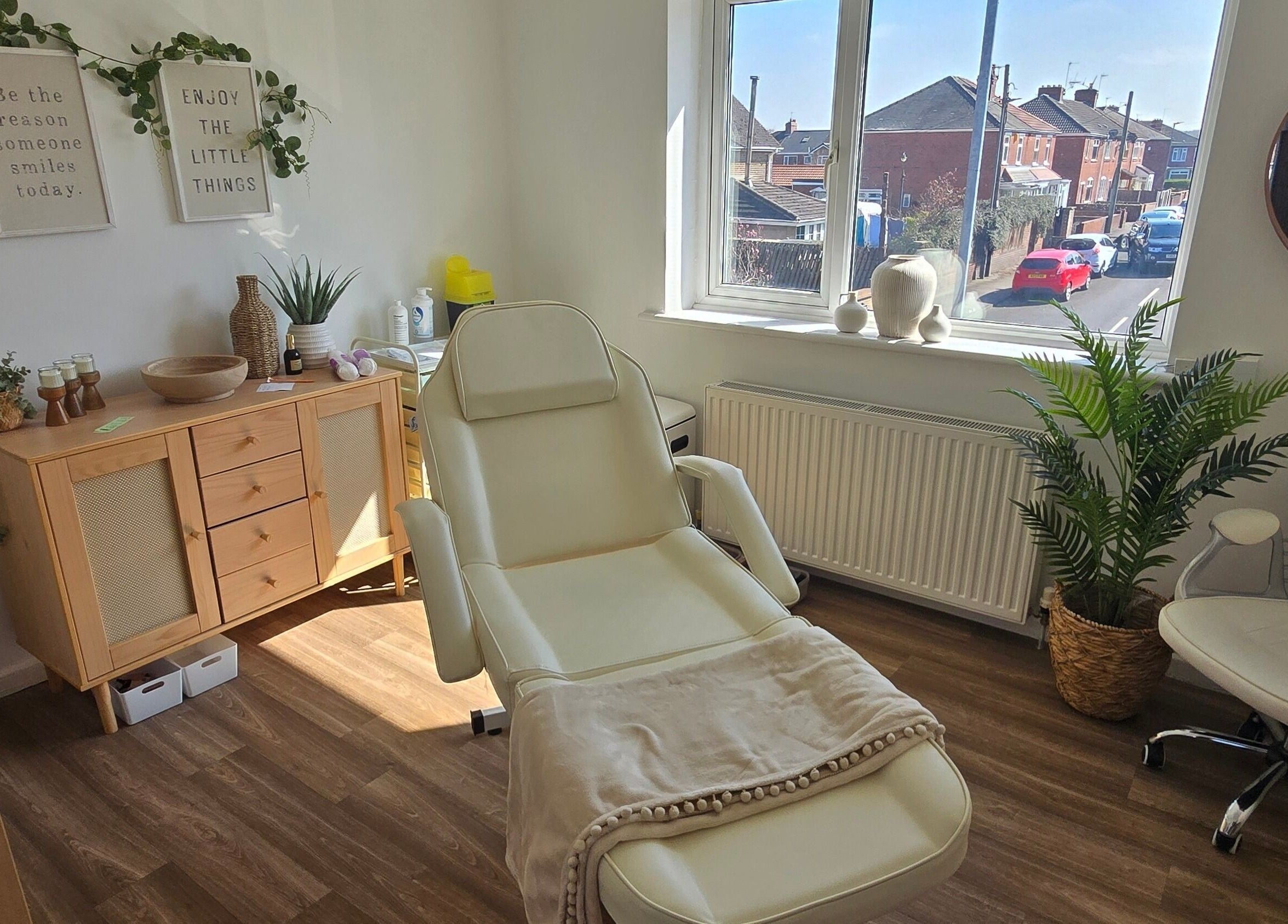 Relaxing treatment room at U Aesthetics, South Elmsall, England, GB, highlighting a comfortable chair and soothing decor.