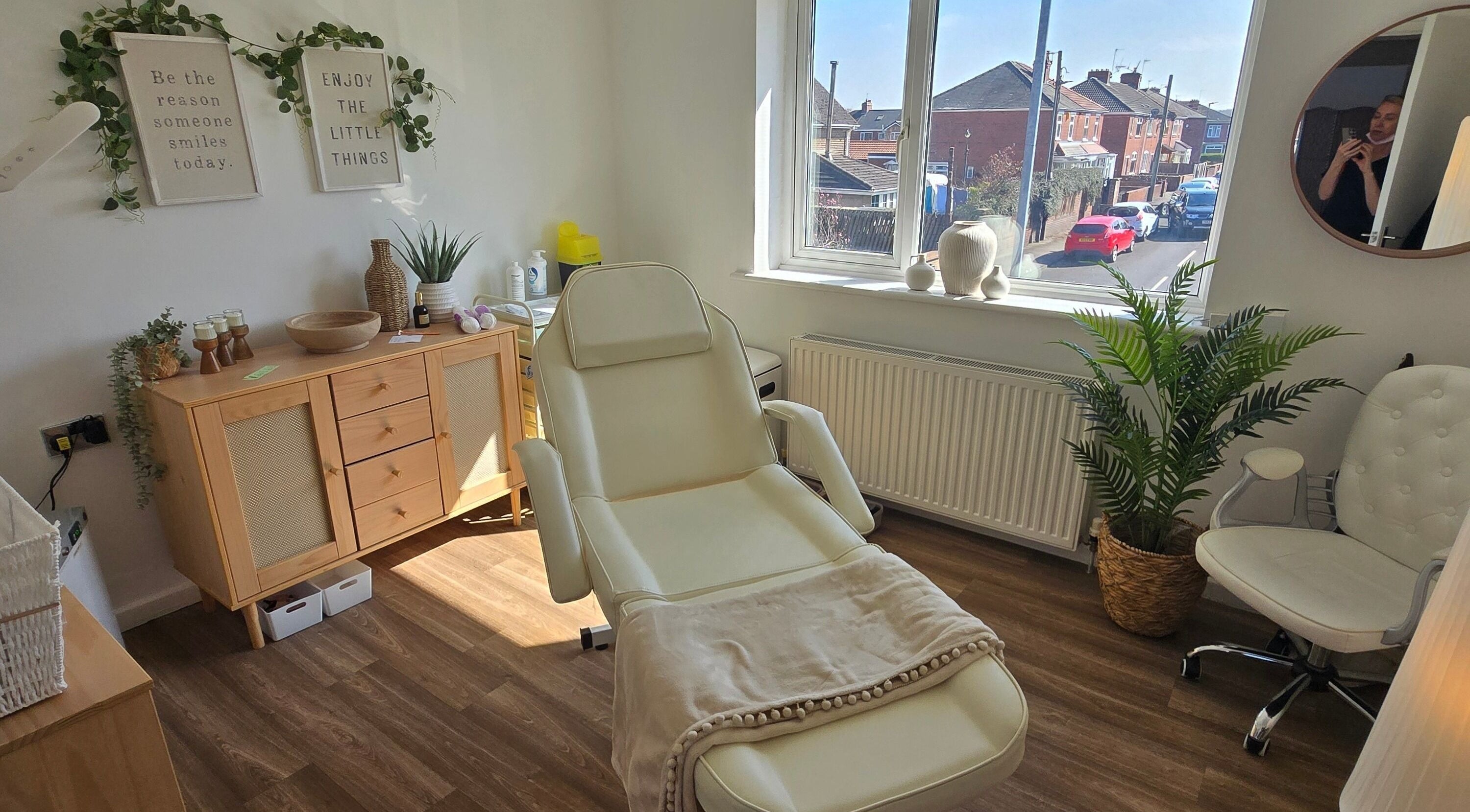 Relaxing treatment room at U Aesthetics, South Elmsall, England, GB, highlighting a comfortable chair and soothing decor.