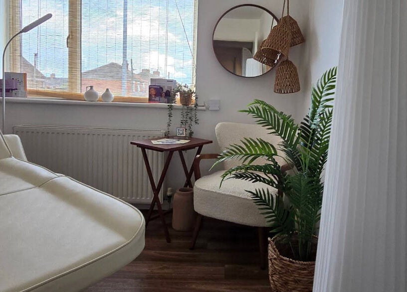 Cozy treatment room at U Aesthetics, South Elmsall, England, GB with elegant decor and natural light.