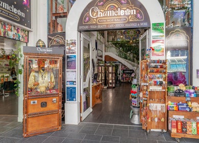 Entrance of Chameleon New Age Salon 🌈 in Surfers Paradise, Queensland, AU showcasing vibrant decor and products.