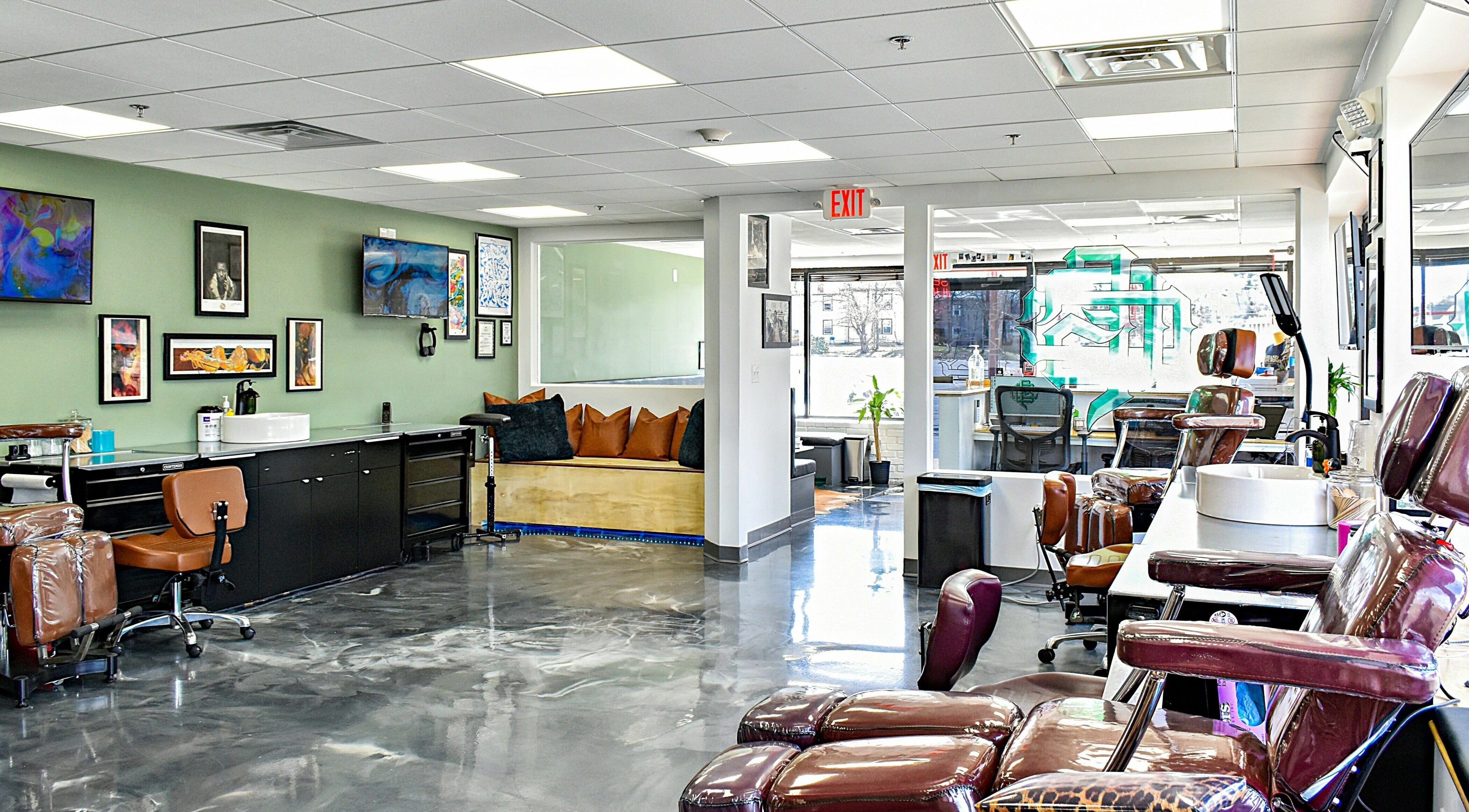 Inside view of Grand Flourish Tattoos, showing sleek design in Brockton, Massachusetts, US.