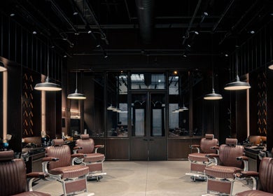 Modern barber chairs at Grand Central in New York, New York, US, embodying luxury and style.