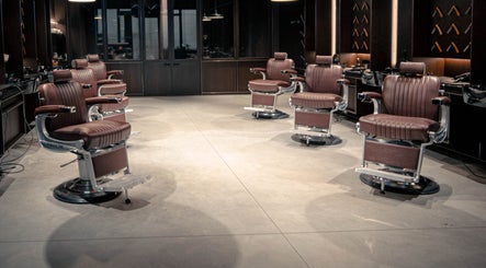Elegant barber chairs at Grand Central, New York, New York, US, offering premium grooming services.