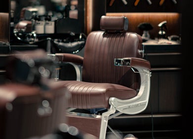 Elegant vintage barber chair at Grand Central, New York, New York, US, showcasing classic style and comfort.
