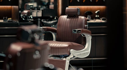 Elegant vintage barber chair at Grand Central, New York, New York, US, showcasing classic style and comfort.