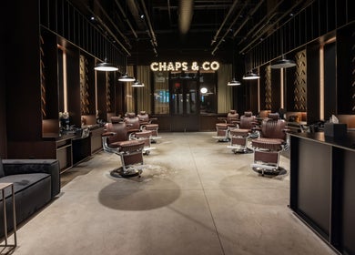 Elegant barber chairs and interior at Grand Central, New York, New York, US, offering premium grooming services.