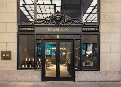 Grand Central storefront entrance in New York, New York, US, featuring a chic black and stone facade.