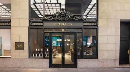 Grand Central storefront entrance in New York, New York, US, featuring a chic black and stone facade.