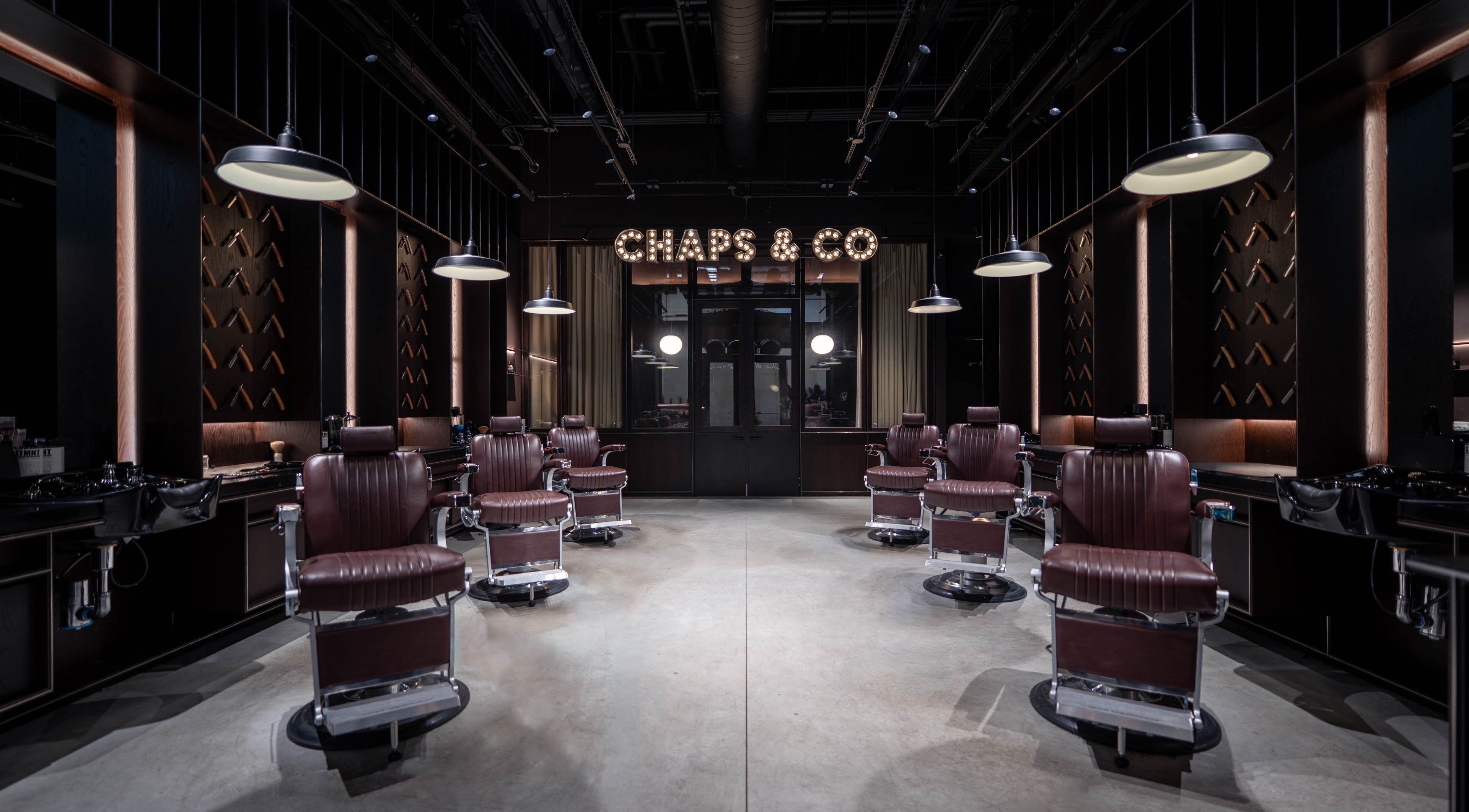 Luxurious barber chairs at Grand Central, New York, New York, US, offering premium wellness services.