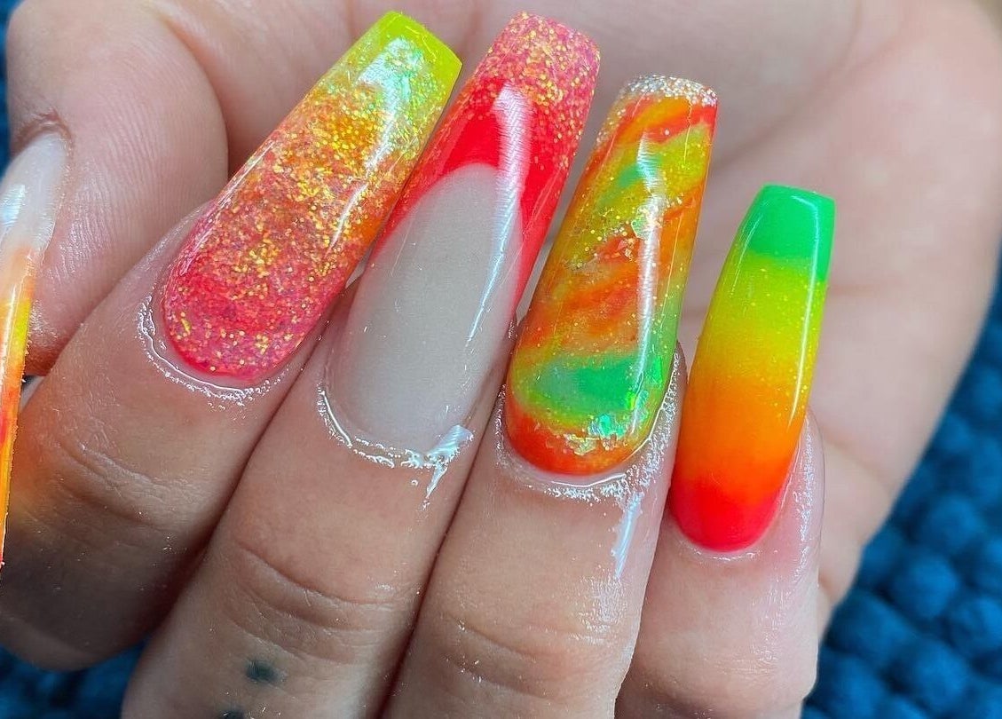 Colorful nail art design at Nails by TyneJane, Wigan, England, GB showcasing vivid colors and intricate details.