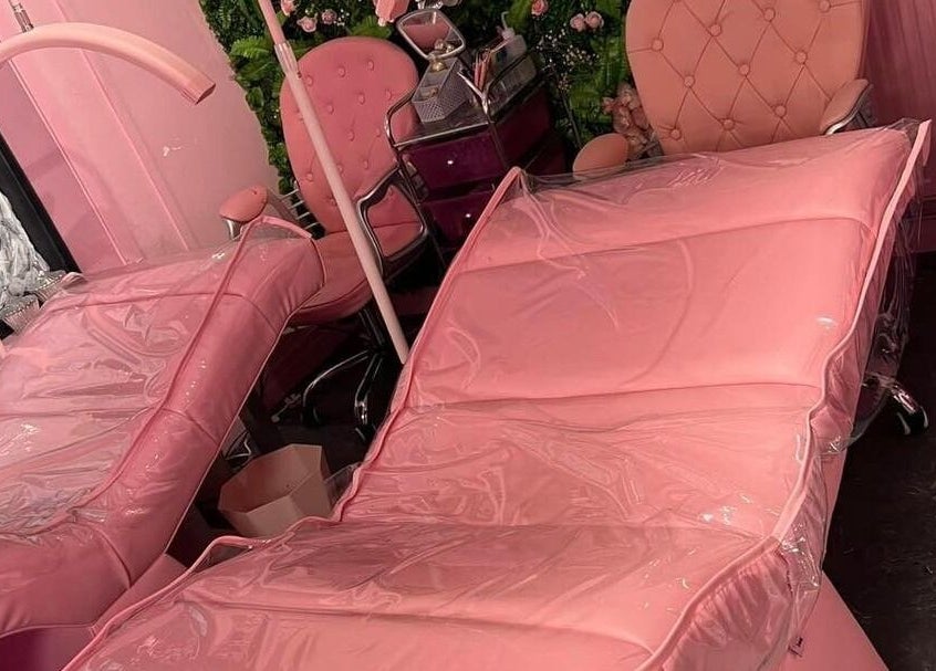 Luxurious pink treatment beds at L.C Beauty and Aesthetics, Wigan, England, GB. Elegant and inviting ambiance.