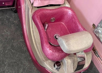 Luxurious pink pedicure chair at L.C Beauty and Aesthetics in Wigan, England, GB, offering premium comfort.