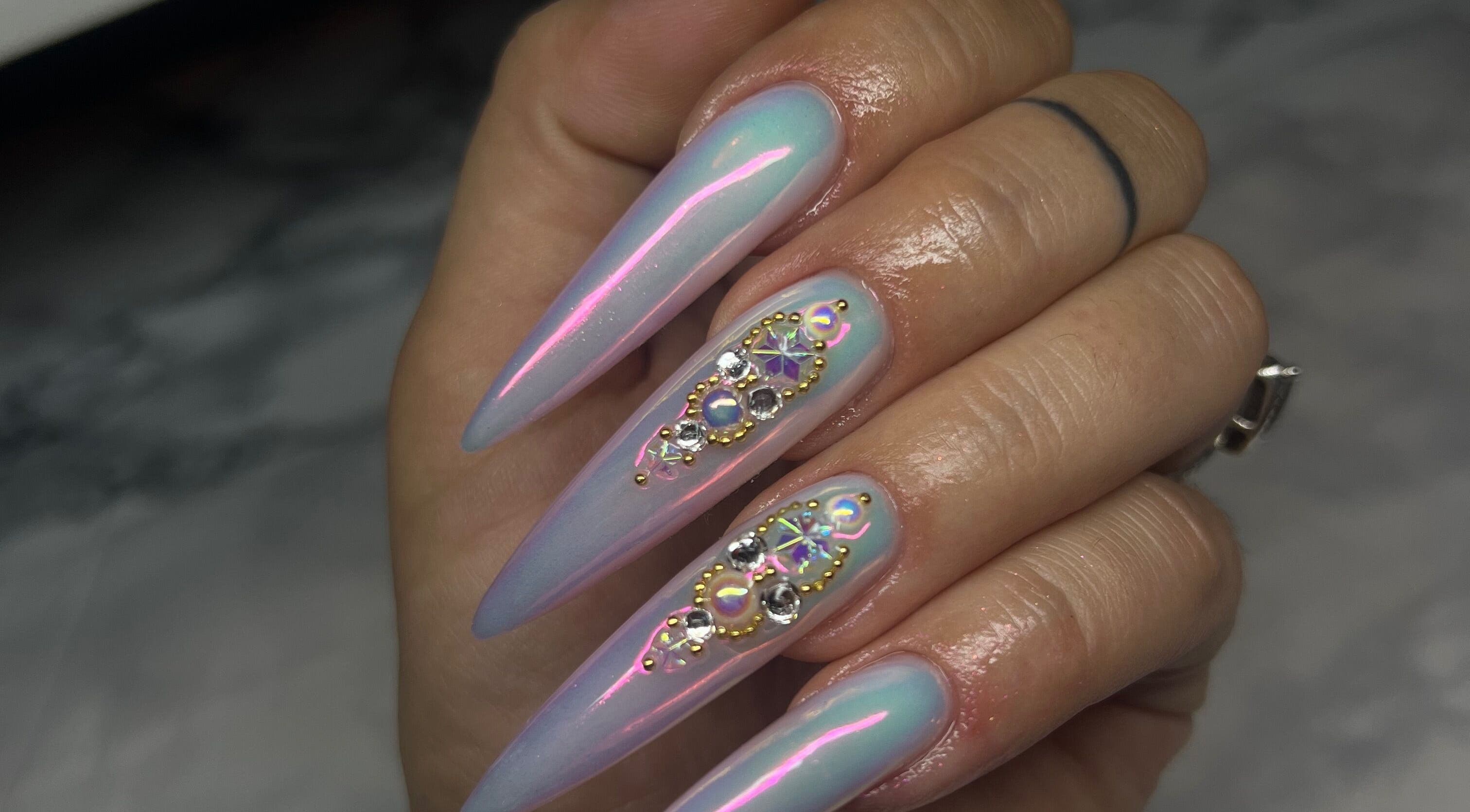 Elegant shimmering nail art with gems at Gatz Beauty Vision, Wellingborough, England, GB.