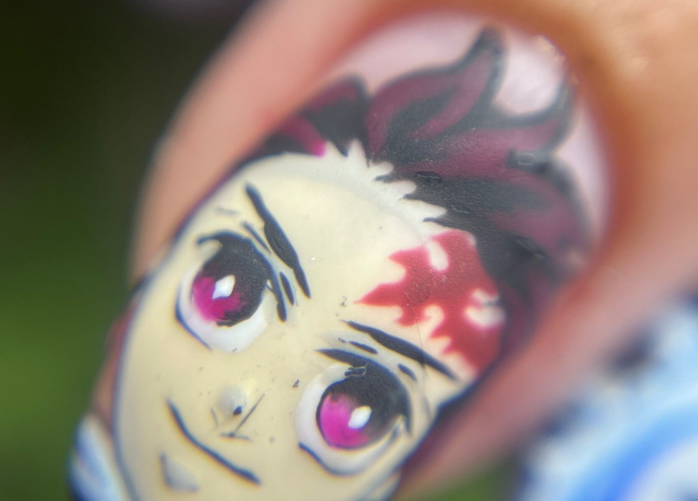 Intricate anime character nail art at Gatz Beauty Vision, Wellingborough, England, GB.