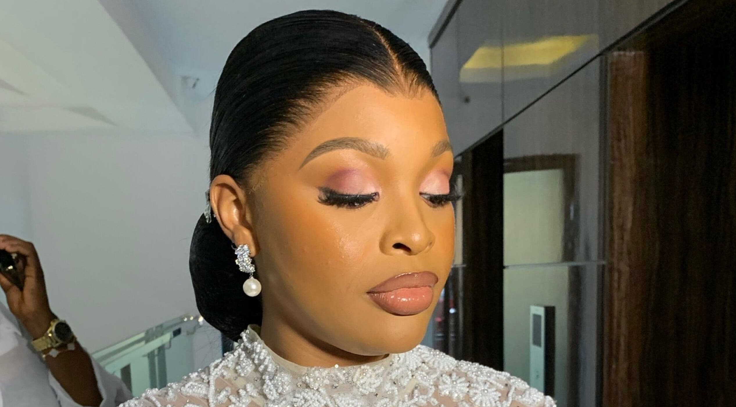 Elegant makeup and hairstyle at SOARS Artistry, Abuja, Federal Capital Territory, NG.