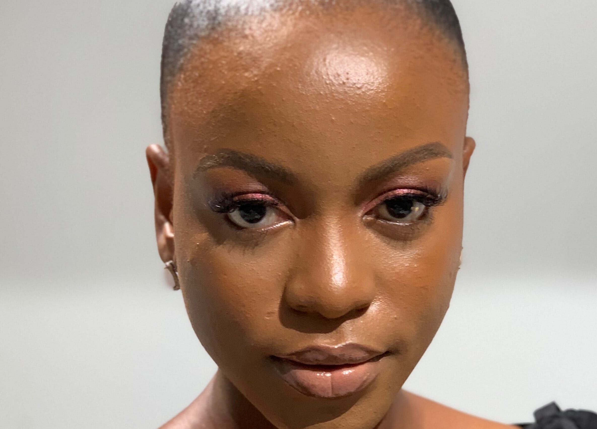 Close-up of a model with elegant makeup at SOARS Artistry, Abuja, Federal Capital Territory, NG.