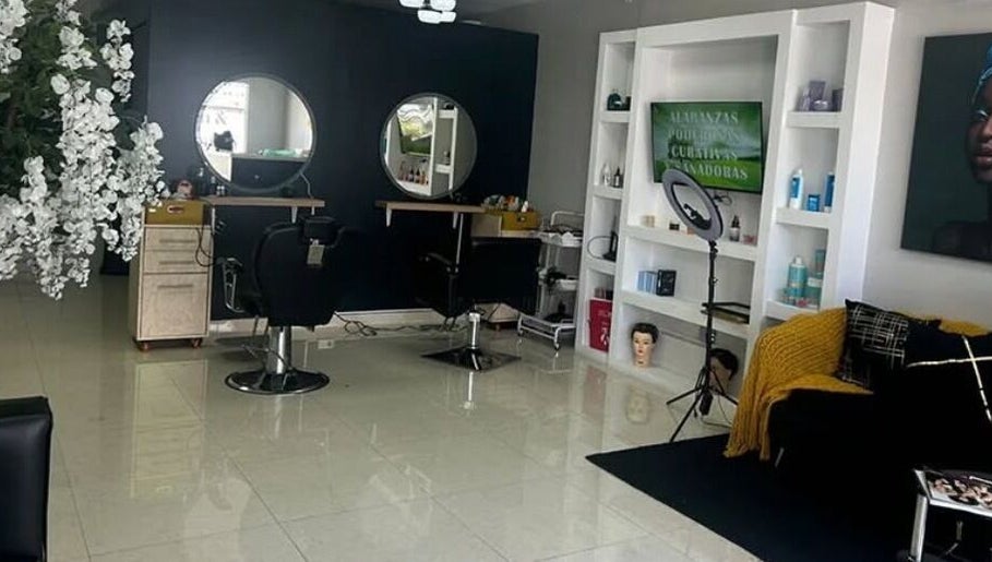 Interior view of Celeniabeautysalon, Philipsburg, Sint Maarten, SX featuring chic styling stations and decor.