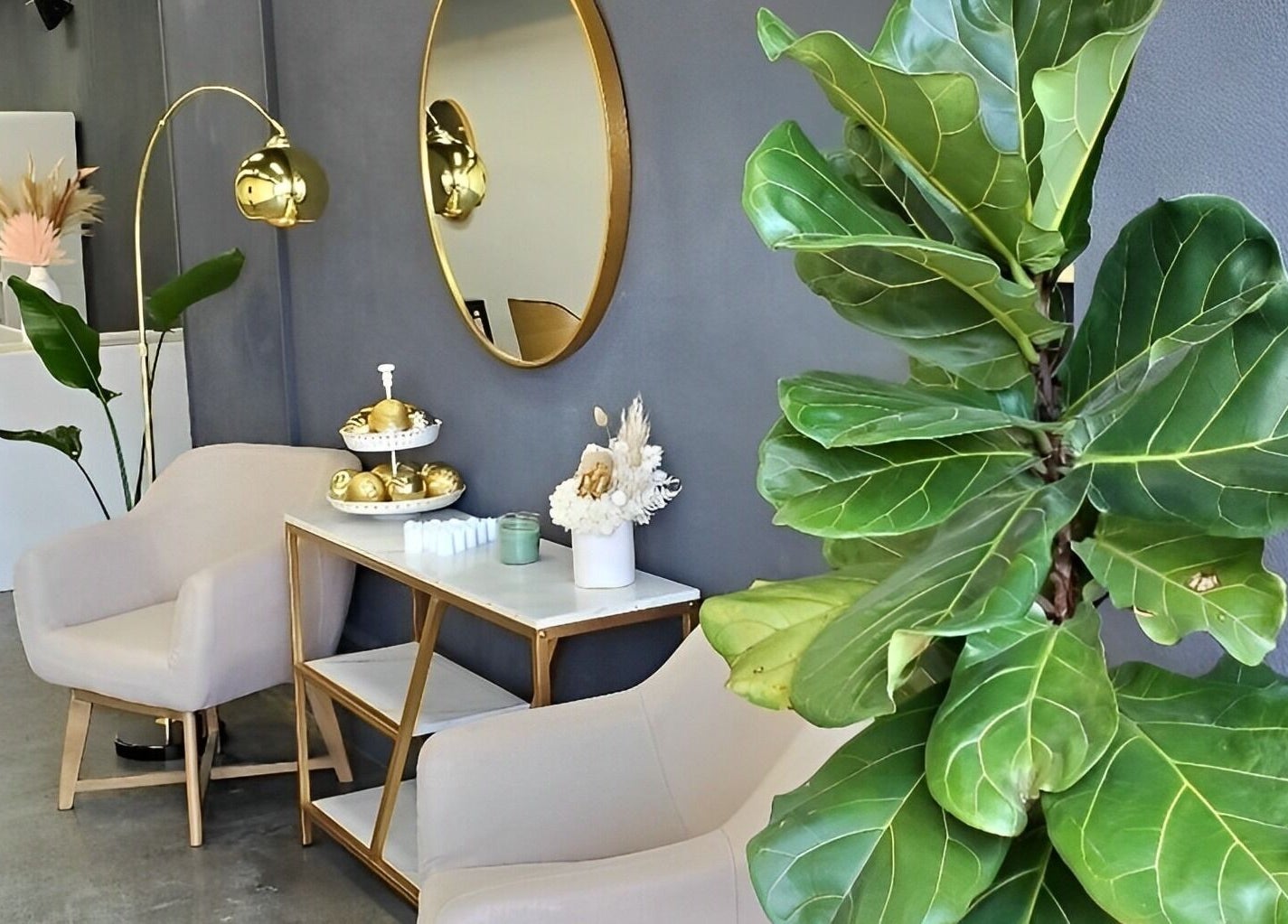Elegant waiting area at Salon Share Richmond in Richmond, Victoria, AU with plants and soothing decor.