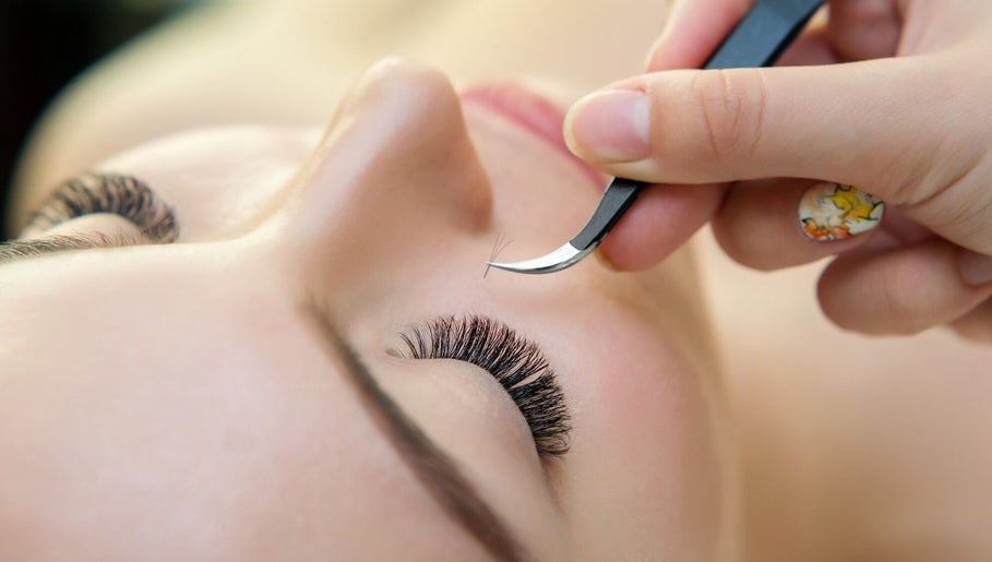 Expert lash application at Beauty Overdose in Palmerston North, Manawatū-Whanganui, NZ, enhancing eye beauty.