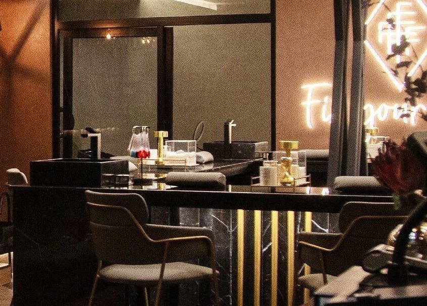 Luxurious interior of Fix Nails Spa and Salon in Al Khobar, Eastern Province, SA with chic decor and plush seating.