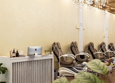 Interior of Timeless Style in Melbourne, Victoria, AU, showcasing relaxing massage chairs and elegant decor.