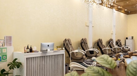 Interior of Timeless Style in Melbourne, Victoria, AU, showcasing relaxing massage chairs and elegant decor.