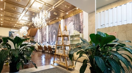 Chic interior of Timeless Style with chandeliers and plants in Melbourne, Victoria, AU.