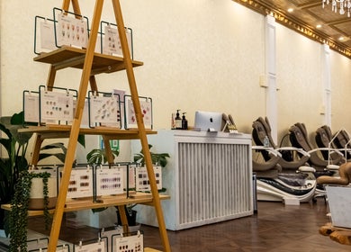 Chic nail salon interior at Timeless Style in Melbourne, Victoria, AU with plush seating and vibrant decor.