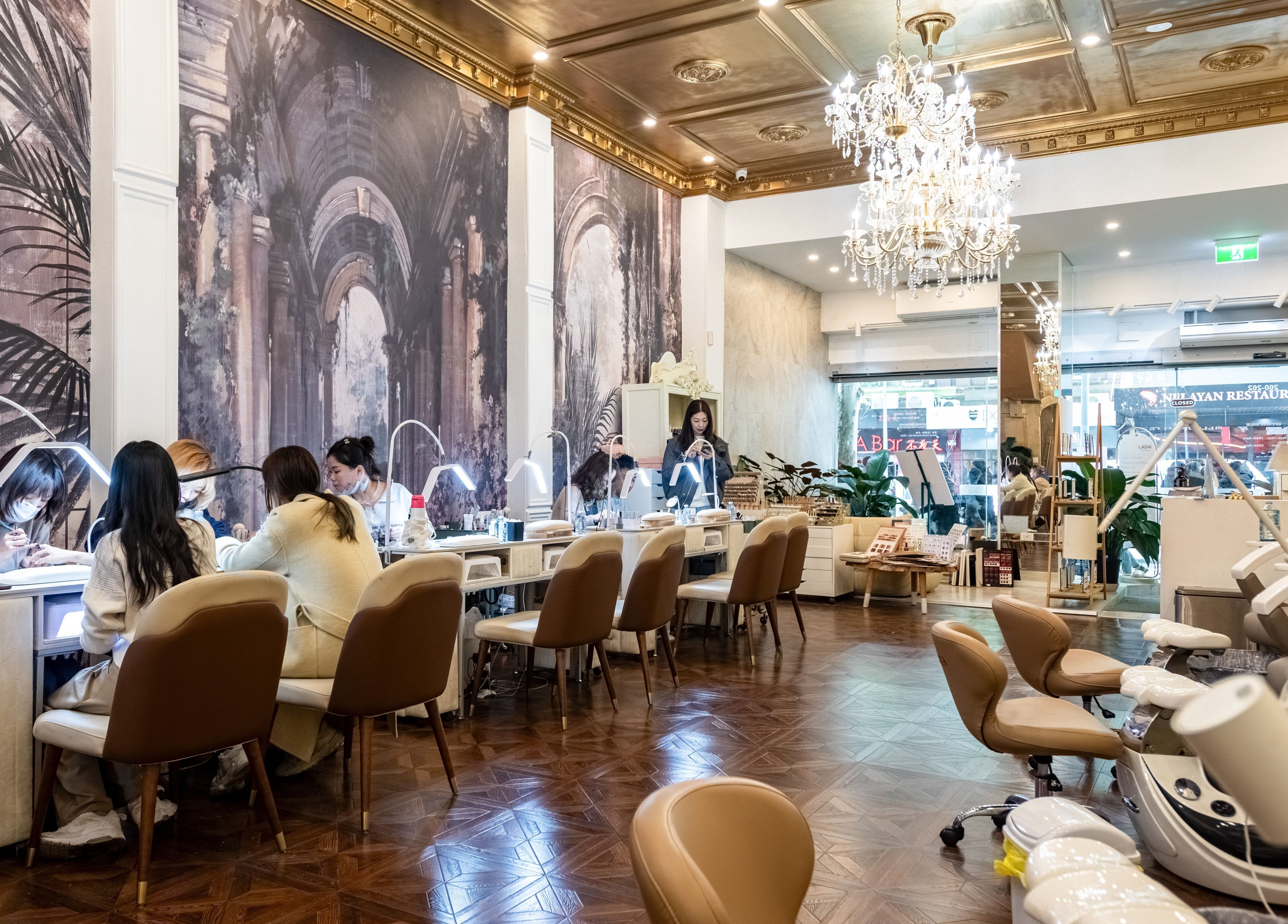 Chic salon interior of Timeless Style in Melbourne, Victoria, AU, featuring elegant decor and plush seating.