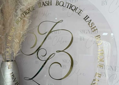 Sophisticated decor at ILashBoutiqúe, Wolverhampton, England, GB featuring pampas grass and branding.