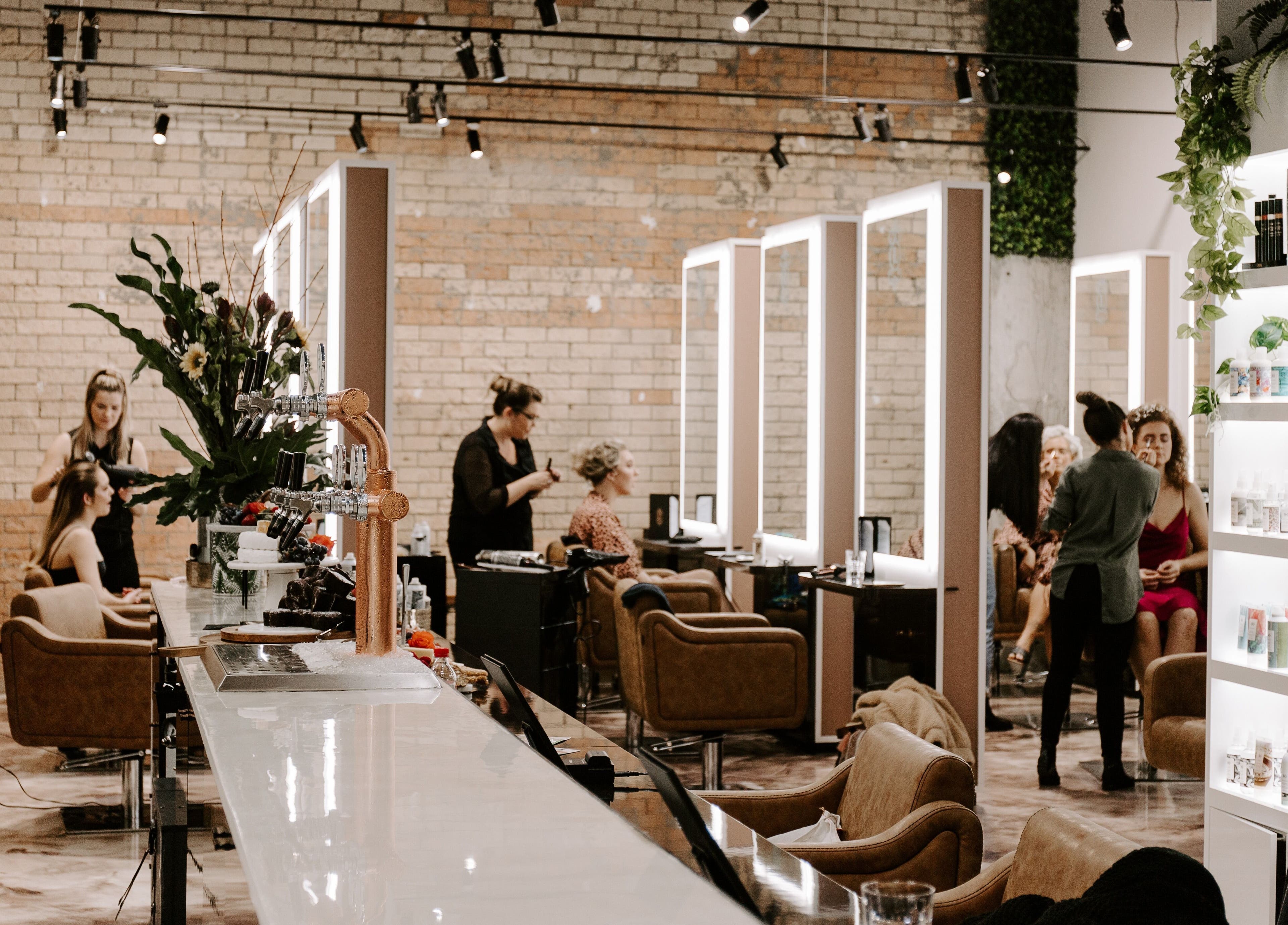 Stylish interior of Luppinos Boutique in West End, Queensland, AU, showcasing modern salon setup and services.