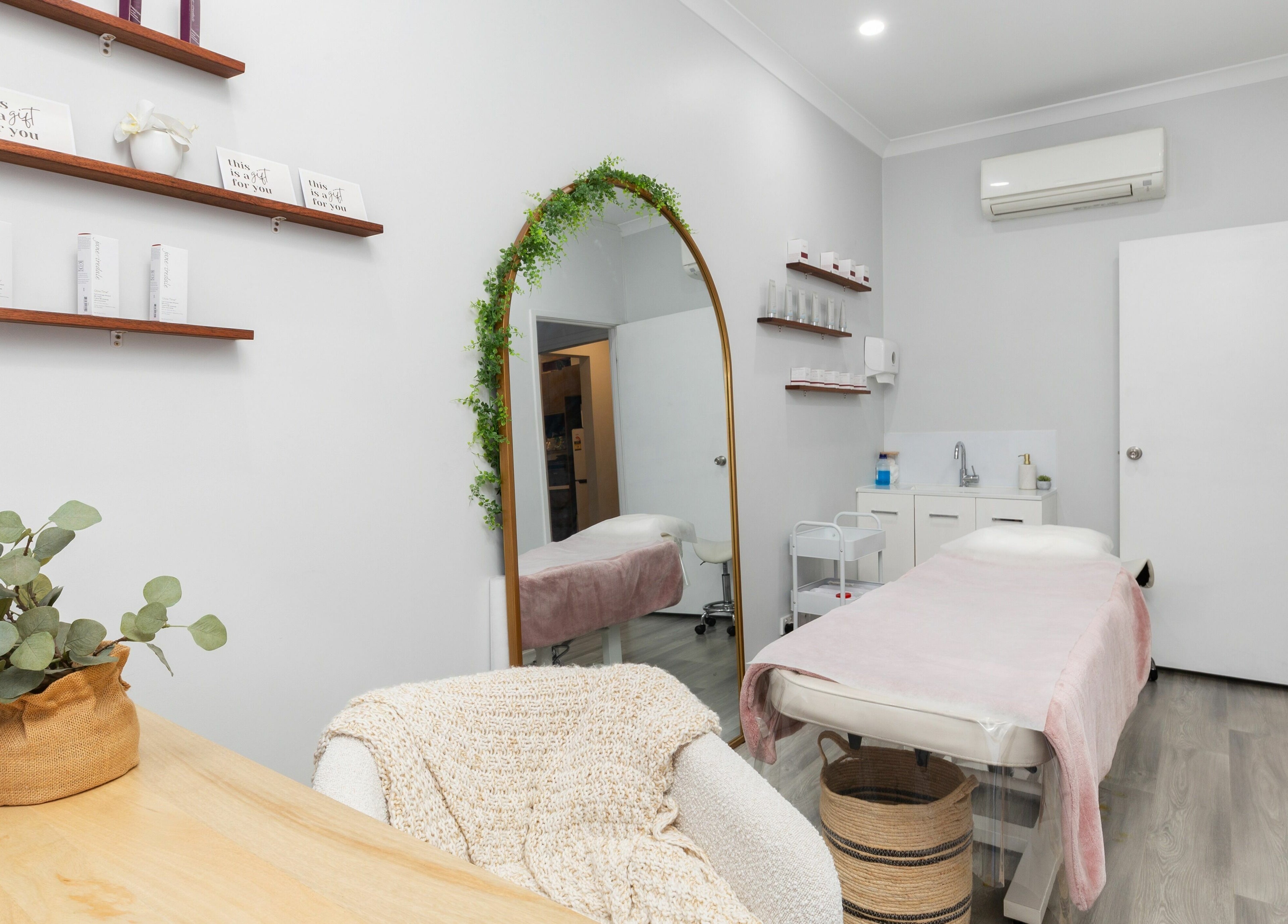 Tranquil treatment room at Fresh Face Australia in Oxenford, Queensland, AU with elegant decor and soothing ambiance.