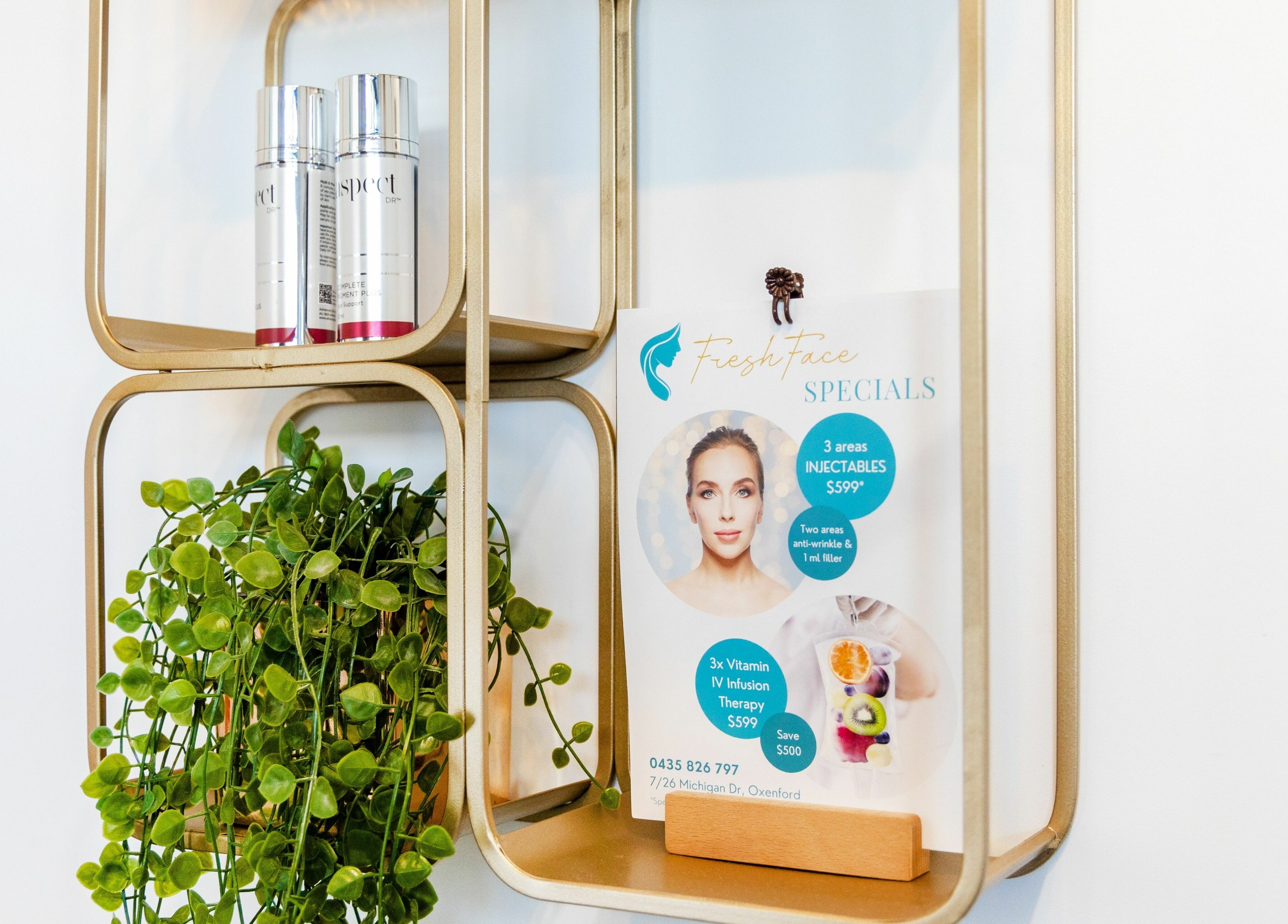 Decorative shelf at Fresh Face Australia in Oxenford, Queensland, AU, featuring skincare products and specials flyer.