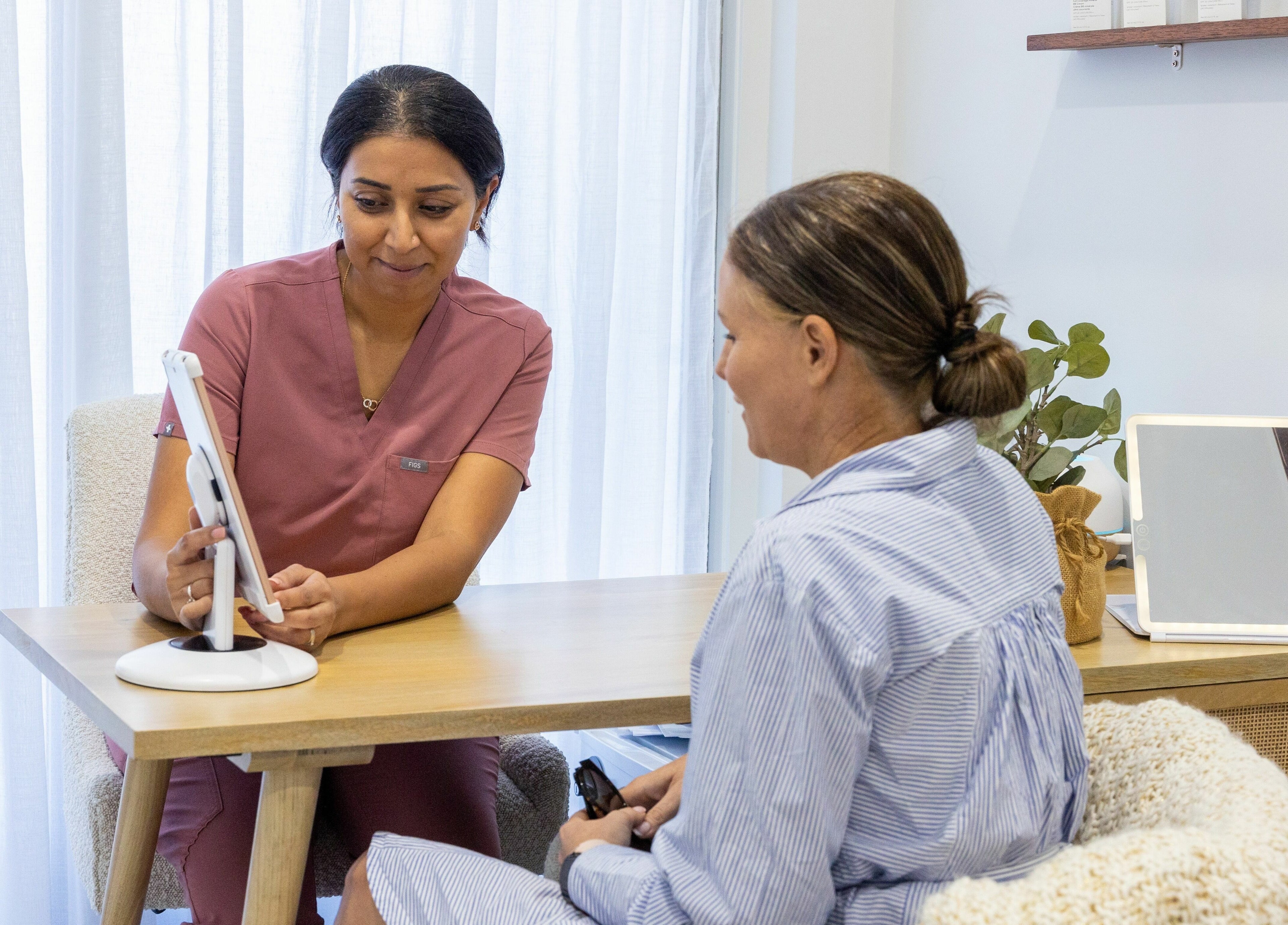 Consultation at Fresh Face Australia, Oxenford, Queensland. Expert advice and friendly service in a serene setting.