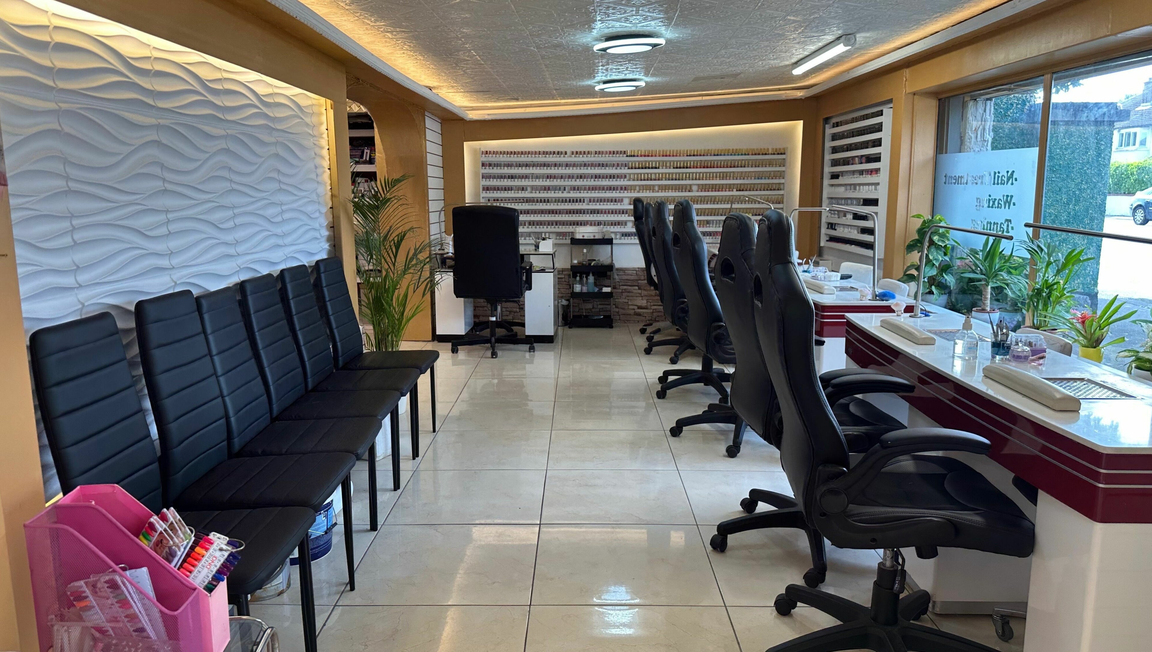 Interior of Lucky Star Nails & Beauty Bar, Dublin 14, featuring sleek nail stations and modern seating.