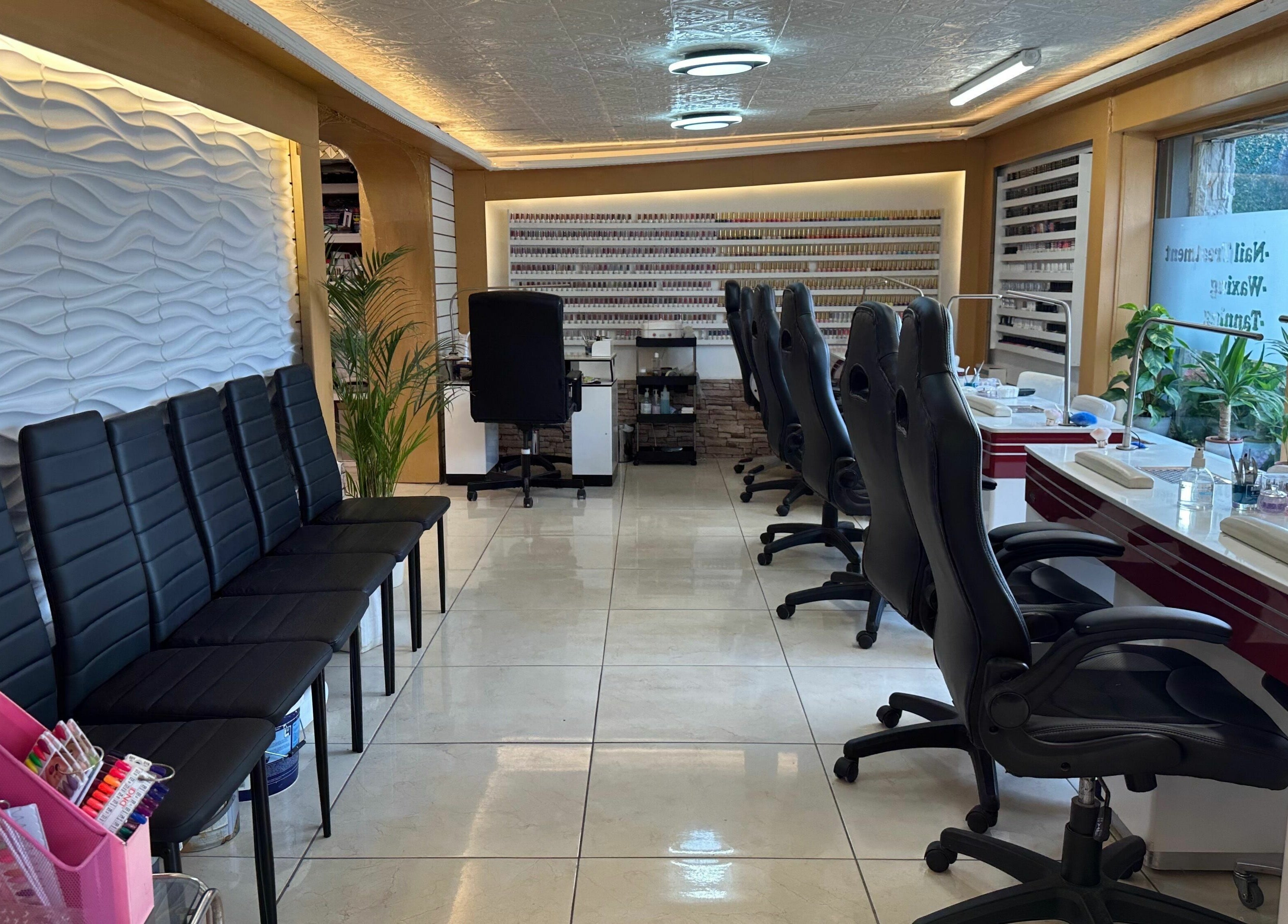 Interior of Lucky Star Nails & Beauty Bar, Dublin 14, featuring sleek nail stations and modern seating.
