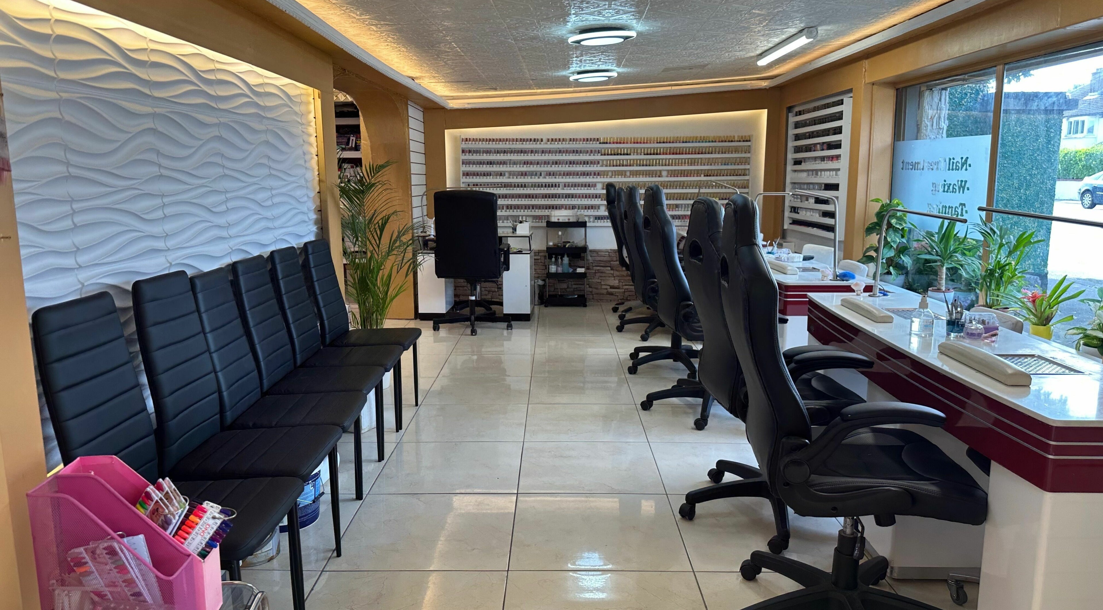 Interior of Lucky Star Nails & Beauty Bar, Dublin 14, featuring sleek nail stations and modern seating.