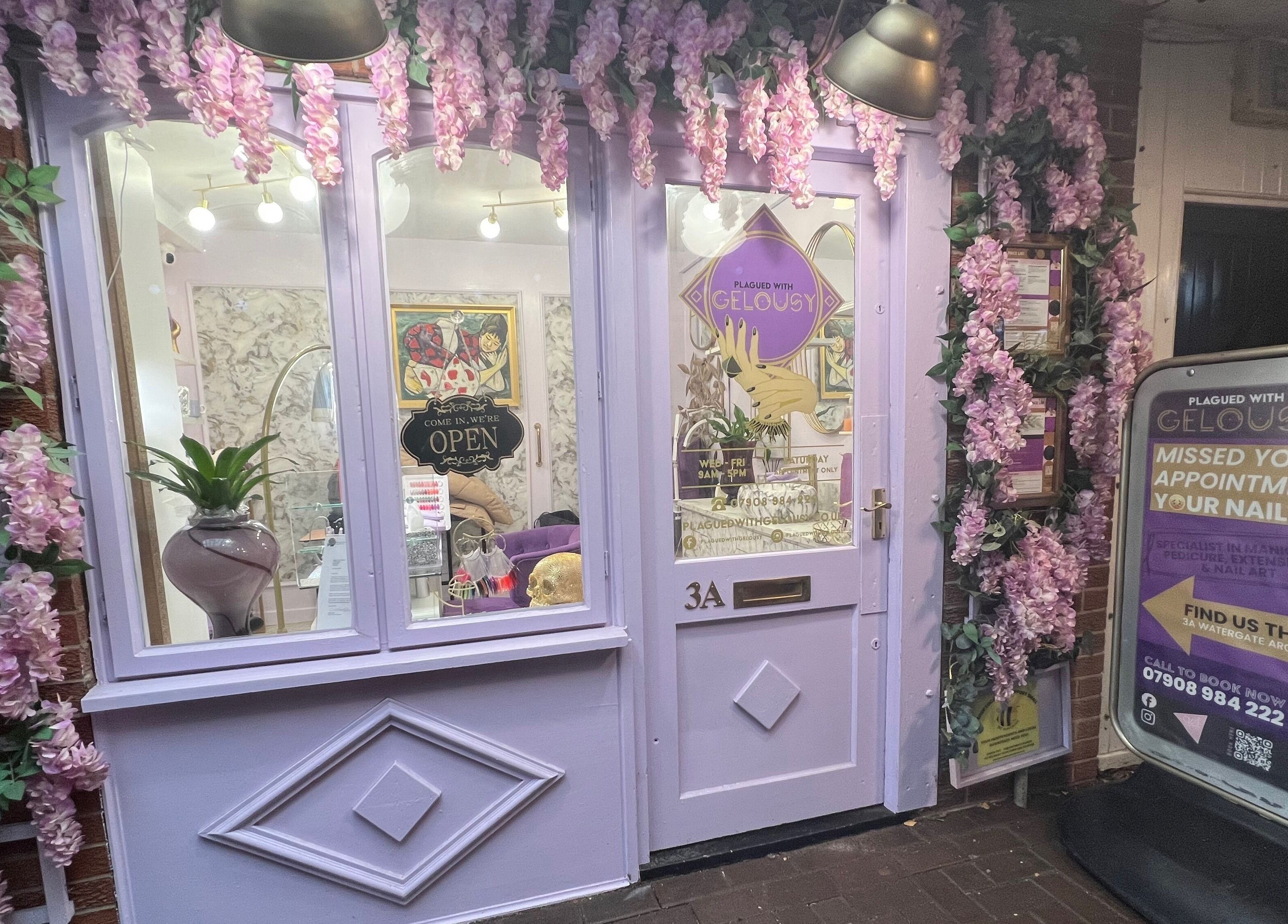 Charming entrance to Plagued With Gelousy, 3A Watergate Arcade SY13 1DP, Whitchurch with lavender decor.