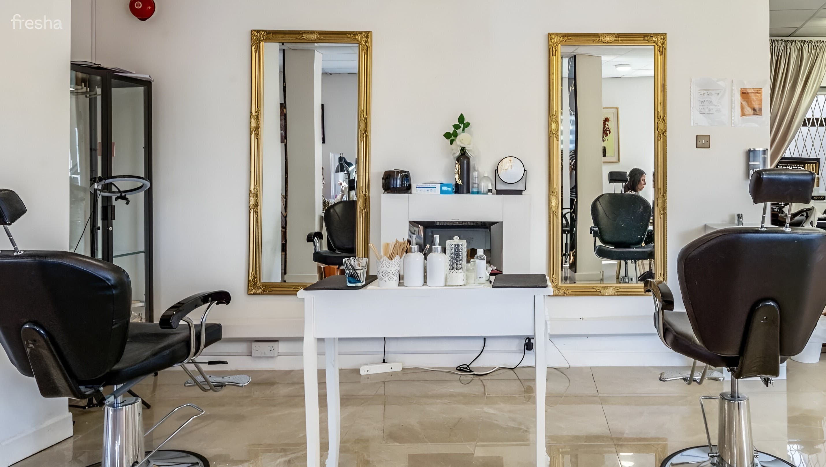 Elegant beauty salon chairs and mirrors at Fifty Shades Nails and Beauty, Dublin, County Dublin, IE.