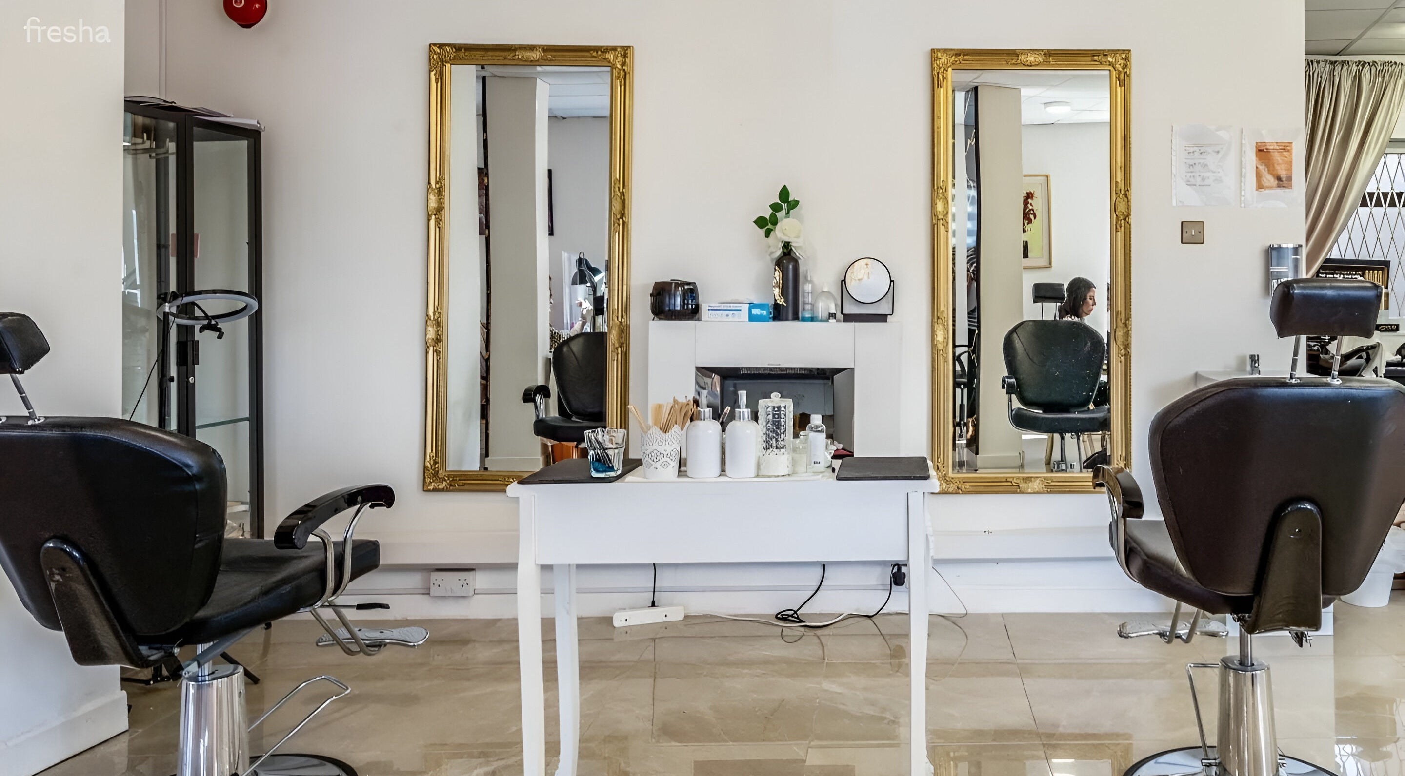 Elegant beauty salon chairs and mirrors at Fifty Shades Nails and Beauty, Dublin, County Dublin, IE.