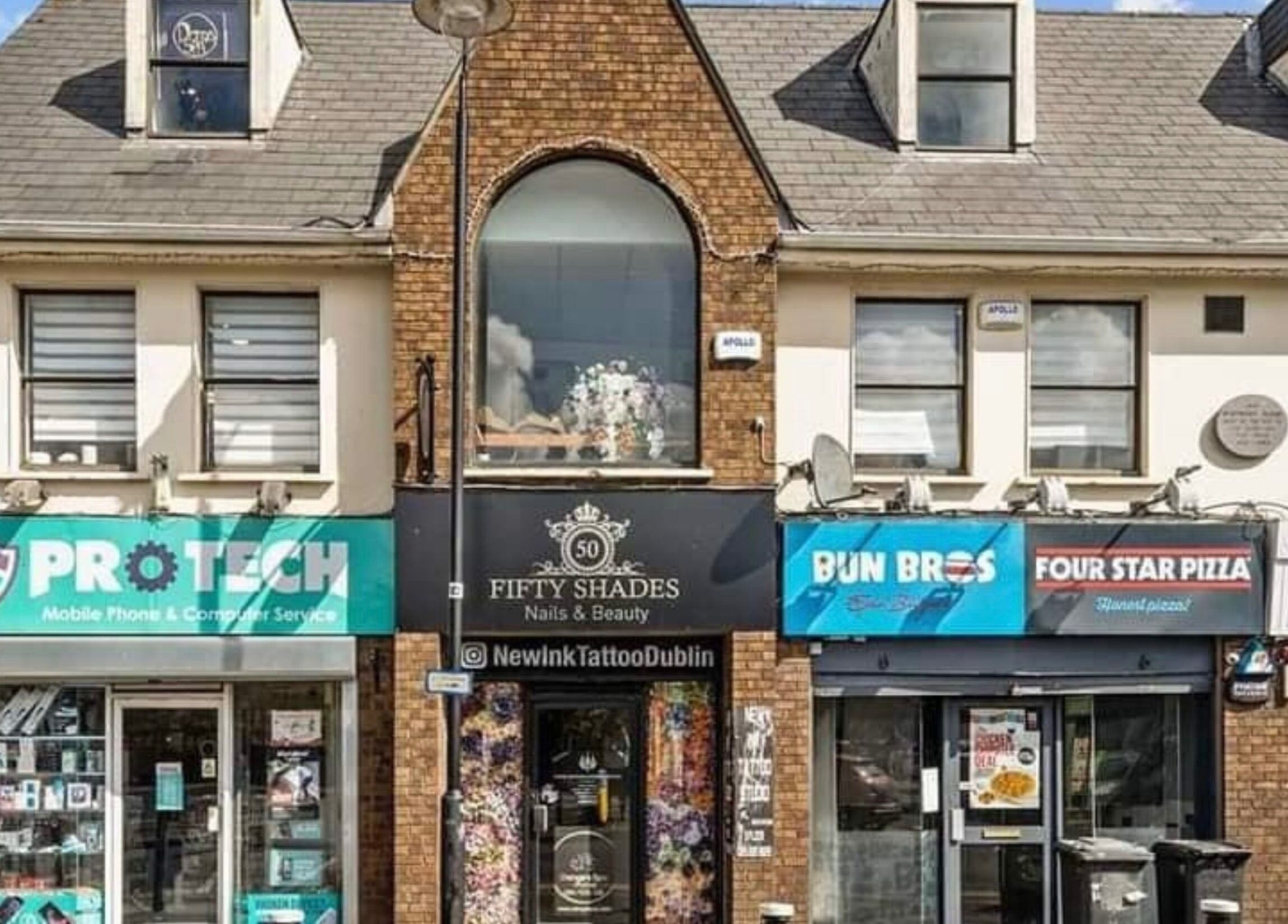 Exterior of Fifty Shades Nails and Beauty at Dublin, County Dublin, IE, showcasing its storefront and surroundings.