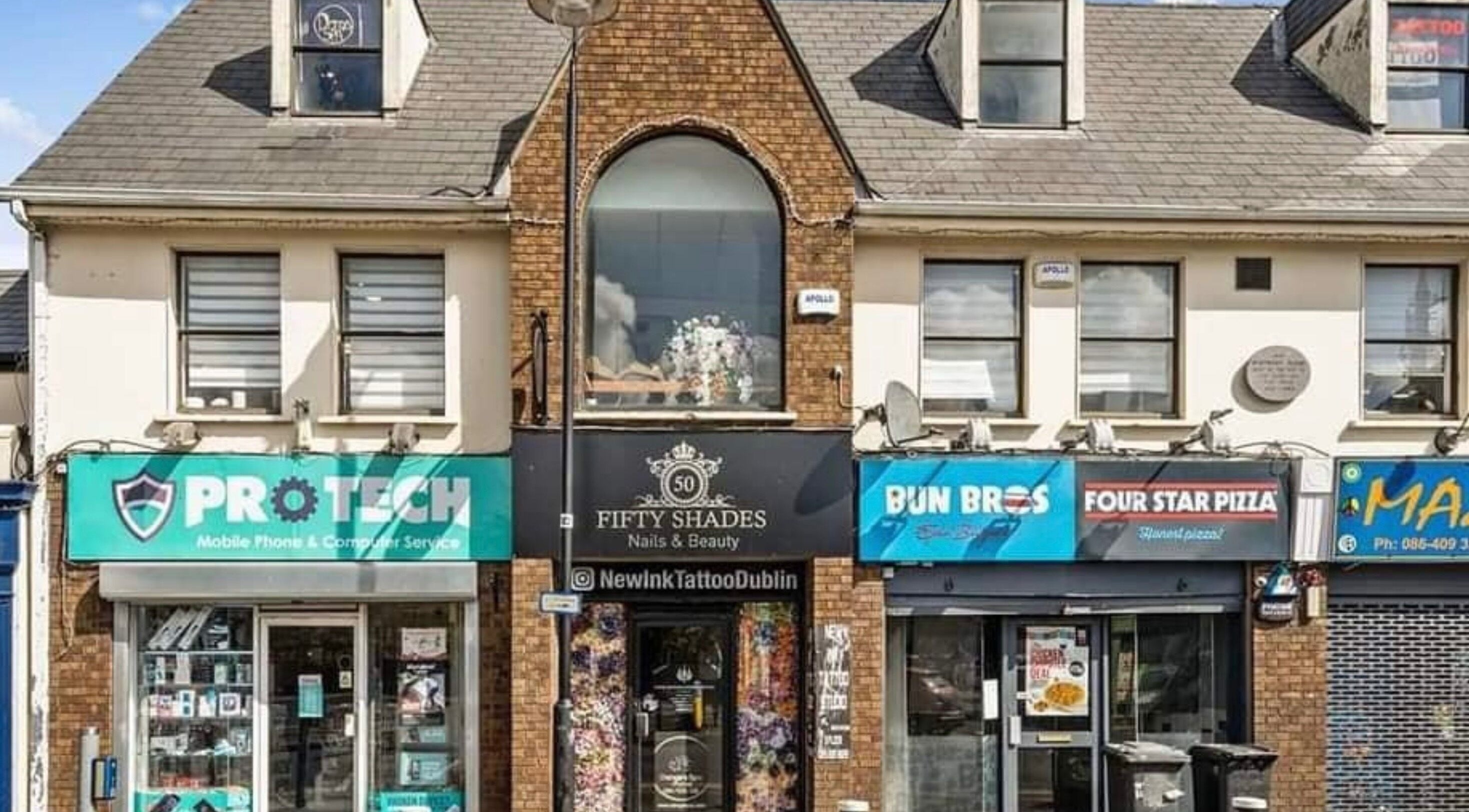 Exterior of Fifty Shades Nails and Beauty at Dublin, County Dublin, IE, showcasing its storefront and surroundings.