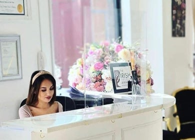 Reception area at Fifty Shades Nails and Beauty, Dublin, showcasing a welcoming and elegant interior design.