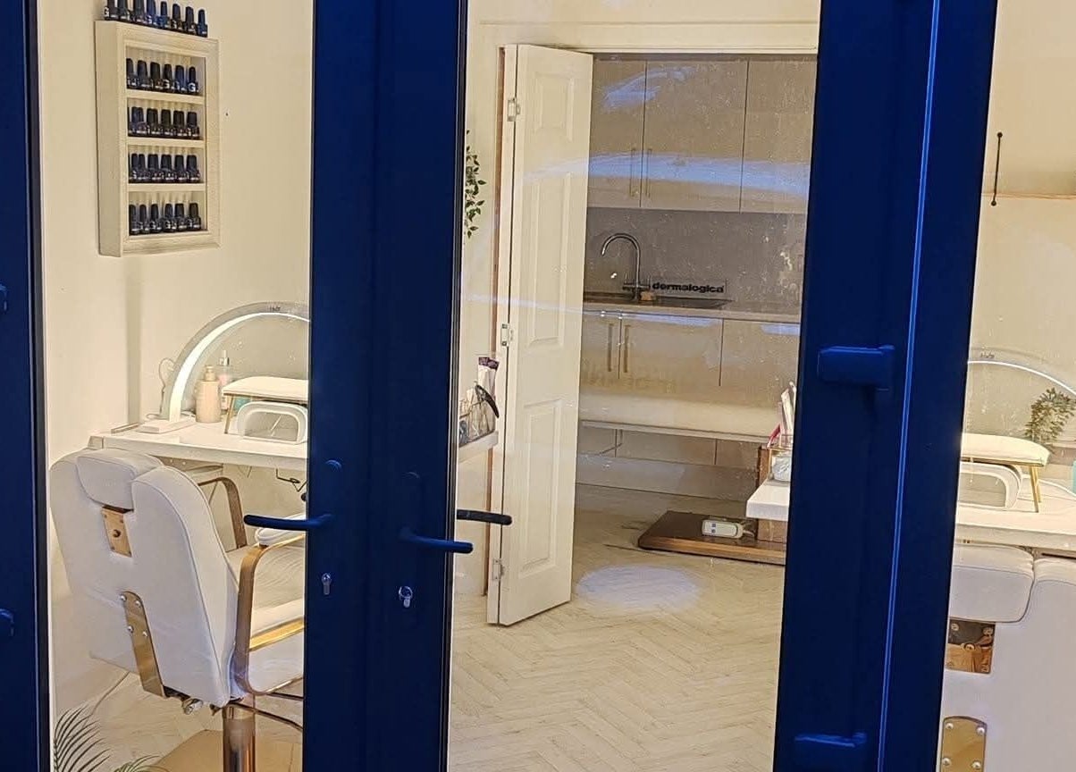 Interior of Blossom Beauty Academy in Beith, Scotland, GB showcasing elegant salon chairs and a serene setting.