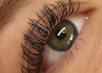 Close-up of eyelash extensions at HLS Beautyy, Veneta, Oregon, US, showcasing detailed eye beauty.