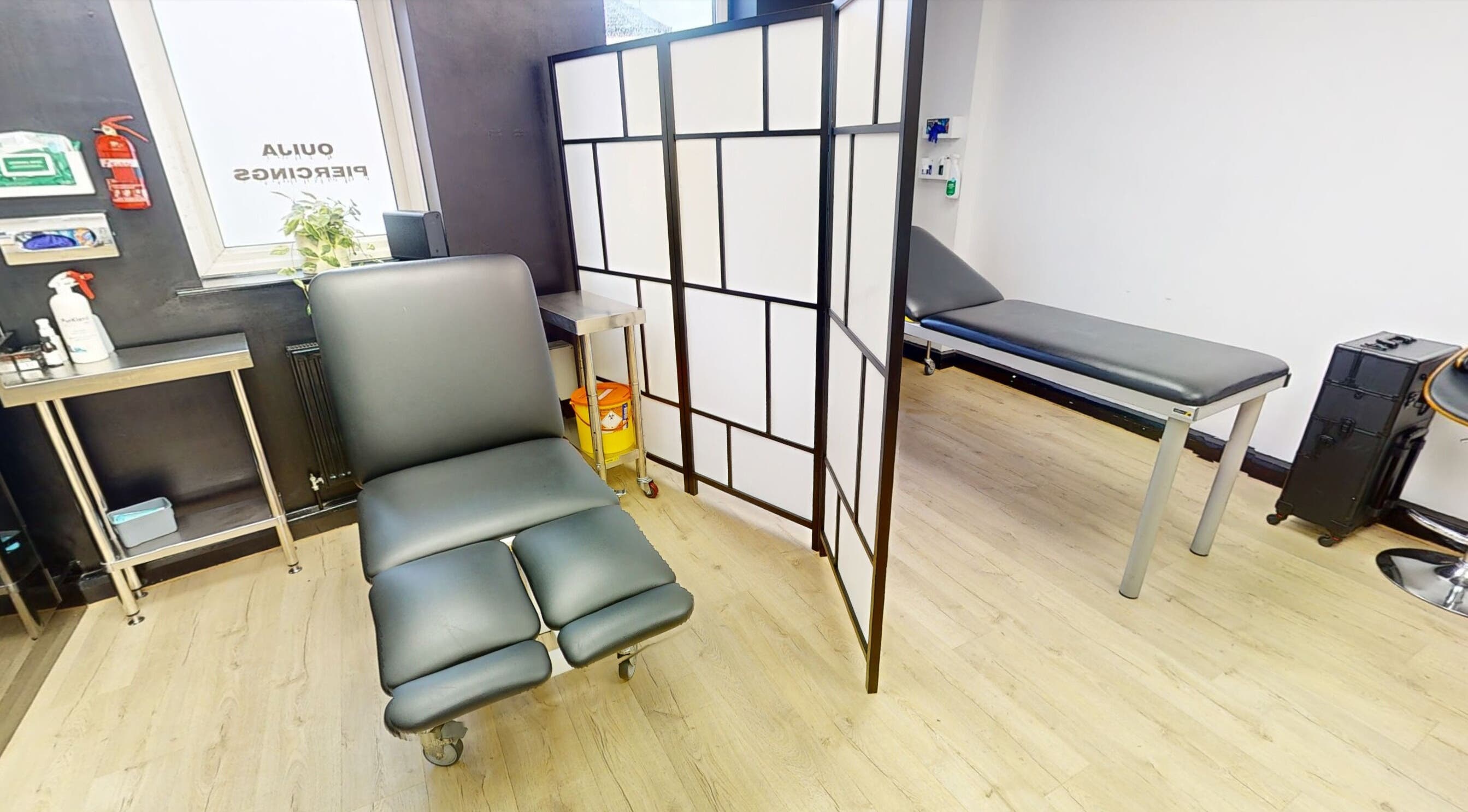 Modern treatment room at Inka Studios, Derby, England, GB featuring sleek furniture and peaceful ambiance.