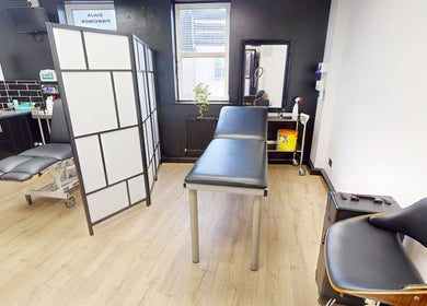 Relaxing room setup at Inka Studios, Derby, England, GB, with massage table and modern decor.