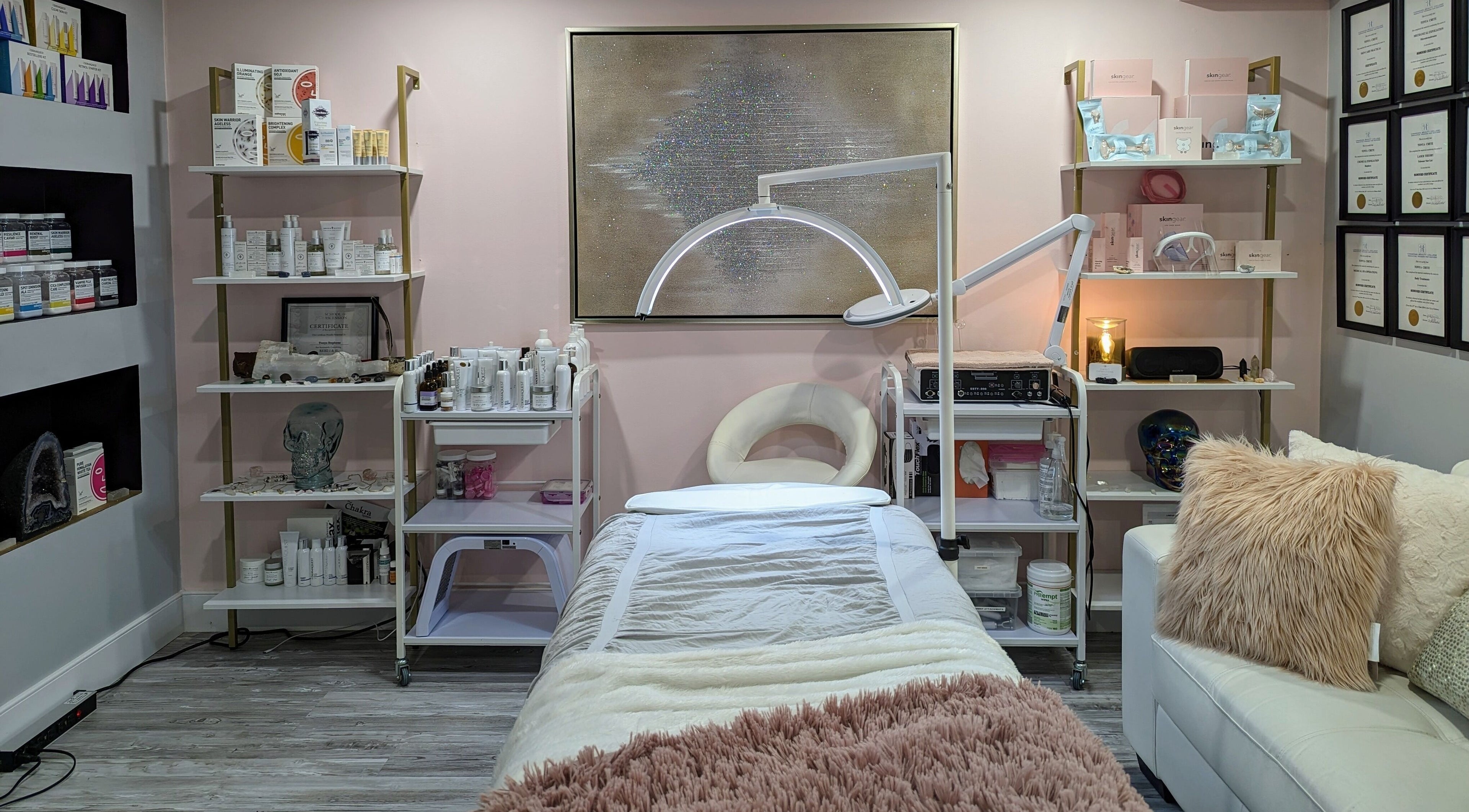 Calming treatment room at Sweet Expressions Medi Spa in Bowmanville, Ontario, CA, showcasing modern decor.