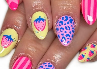 Vibrant tropical nail art at Nailed It with Jess, Ledbury, England, GB featuring strawberries and bold patterns.