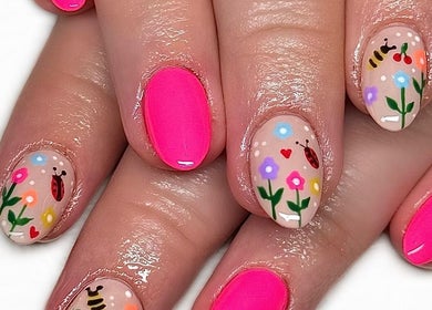 Vibrant floral nail art at Nailed It With Jess, Ledbury, England, GB showcasing bees and ladybugs.